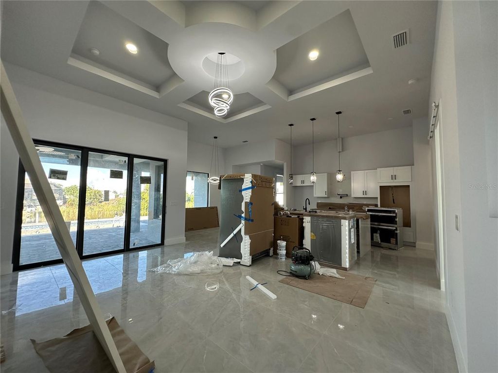 Photo of 933 NW 8th Terrace, Cape Coral, FL 33993 (MLS # A4636025)