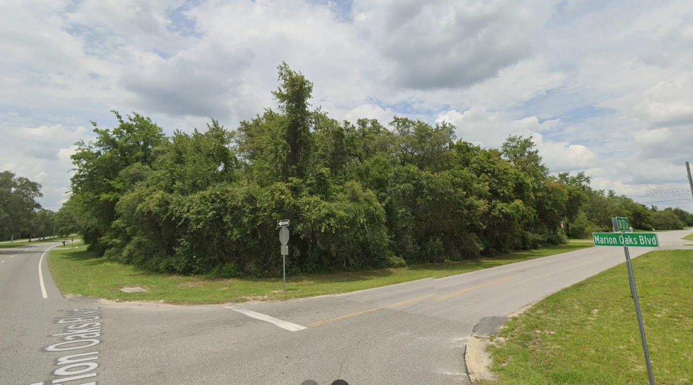 Excellent commercial investment opportunity in Marion Oaks, Ocala, FL. This lot is located directly on Marion Oaks Boulevard, the main avenue of the community, offering high visibility and easy access. The area has paved roads in both the front and back, and is situated in a growing region surrounded by residential homes and businesses. The current zoning is B-2 (Community Business District), which generally allows for a variety of commercial uses. Some potential ideas for development on this site include: retail plaza, restaurant, bakery, café, professional offices, medical, dental or veterinary clinic, fitness center, daycare, grocery store, art gallery, or cultural space. Please note: all options mentioned are only suggestions based on the current zoning, and it is the buyer's responsibility to verify with Marion County which specific uses are permitted for this lot. Don’t miss out on this unique opportunity to own a well-located property with strong appreciation potential in one of Central Florida’s fastest-growing areas.