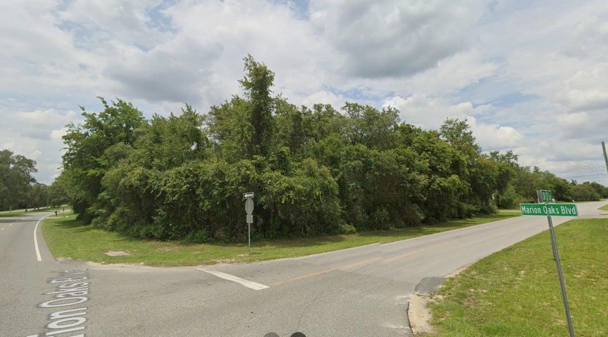 Excellent commercial investment opportunity in Marion Oaks, Ocala, FL. This lot is located directly on Marion Oaks Boulevard, the main avenue of the community, offering high visibility and easy access. The area has paved roads in both the front and back, and is situated in a growing region surrounded by residential homes and businesses. The current zoning is B-2 (Community Business District), which generally allows for a variety of commercial uses. Some potential ideas for development on this site include: retail plaza, restaurant, bakery, café, professional offices, medical, dental or veterinary clinic, fitness center, daycare, grocery store, art gallery, or cultural space. Please note: all options mentioned are only suggestions based on the current zoning, and it is the buyer's responsibility to verify with Marion County which specific uses are permitted for this lot. Don’t miss out on this unique opportunity to own a well-located property with strong appreciation potential in one of Central Florida’s fastest-growing areas.
