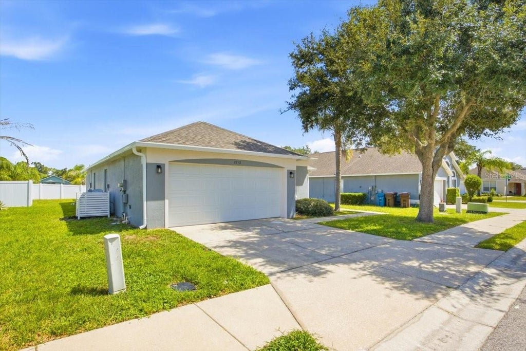 Photo of 2712 Kokomo Loop, Haines City, FL 33844 (MLS # O6433884)