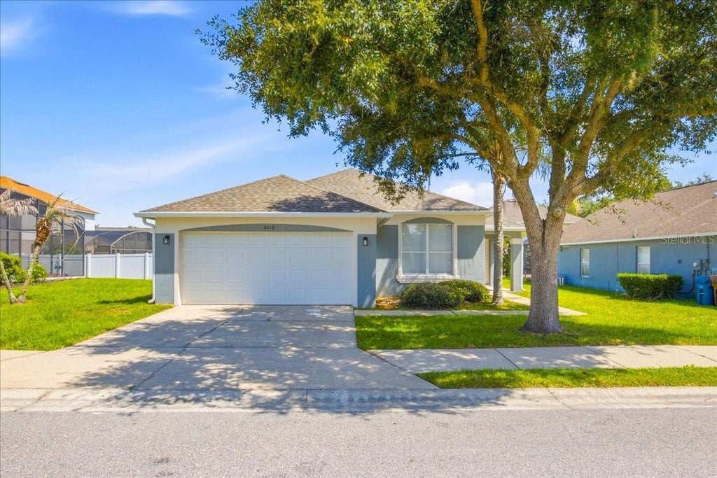 Photo of 2712 Kokomo Loop, Haines City, FL 33844 (MLS # O6433884)