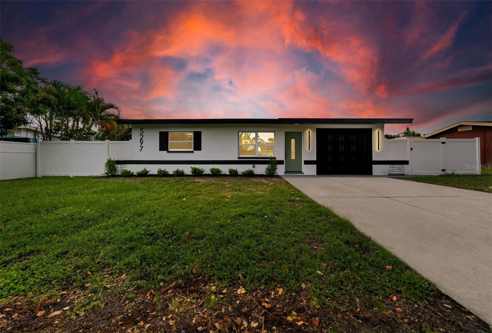 One or more photo(s) has been virtually staged. If you are looking for a Move in Ready, Professionally Renovated Home Look no Further. This is a Fantastic opportunity to own a Solid Block Home in a Centrally located neighborhood near Shops, Dining, Entertainment, between the Gulf Beaches and Vibrant Downtown St. Pete. Split plan Bedrooms. En -Suite Primary Bedroom. Large Family/Dining Room or can be used as an Office. Awesome updated details. Renovated kitchen with New Soft Close Cabinets. Beautiful Quartz Counter Tops, Brand New appliances, Renovated Bathrooms with shower glass enclosure and door. Modern fixtures, Ceiling Fans, and Recessed Lighting. Water resistant premium luxury vinyl floors. New Vinyl Privately fenced Back Yard great for entertaining. Brand new Roof, AC, and Windows. No flood insurance needed. You are going to love it! Make this your home before is too late!
