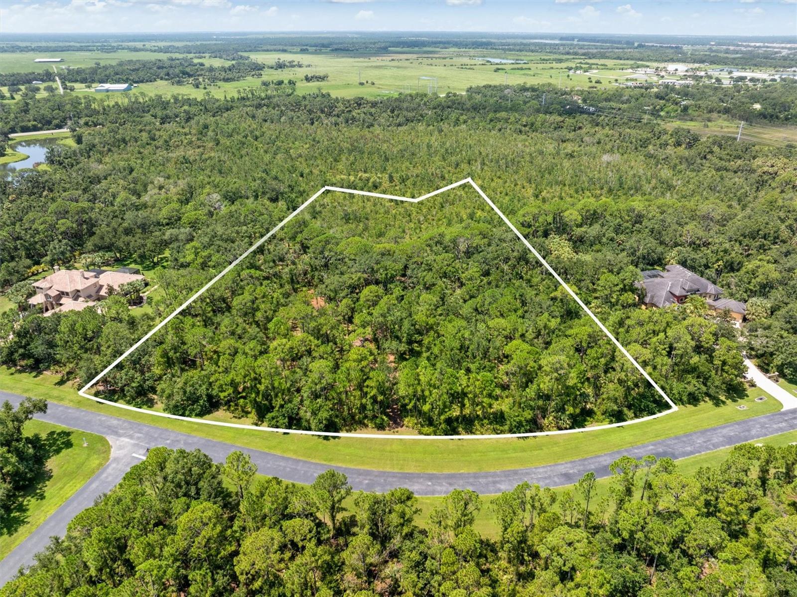 Welcome to the Forest at Hi Hat Ranch- a place where nature and tranquility continue to exist. Now available is this spacious custom homesite which spans almost 4 acres and contains lovely trees and ample elbow room to unwind and enjoy peaceful surroundings. The Forest is a truly unique community, located on SR72, the conveniences of Sarasota are nearby but you might feel as if you're in a slice of old Florida. With 54 homesites, all from 3 to 5 acres, the Forest is a uniquely upscale acreage development. Purchasers may choose from a list of approved builders that includes Anchor, Rutenberg, John Cannon, Lee Wetherington, Nautilus, Neal Homes and Yoder Homes. Partner with any of these builder to create your ultimate acreage estate!