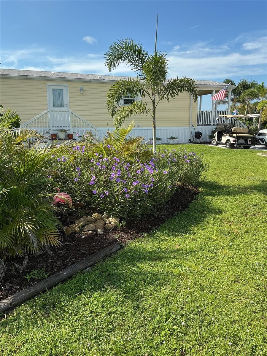 Nearly new 1BR,1Bath home in desirable recreational waterfront community. NO AGE RESTRICTIONS & YOU OWN YOUR OWN LOT, very low HOA dues. Amenities include lawn maintenance, large clubhouse, 2 pools (1 heated), tennis/pickleball, bocce, horseshoe courts, driving range, boat ramp and docks (with quick access to Myakka River), RV/boat storage. Lots of community activities and just a few minutes from beautiful, quiet Boca Grande beaches.
Built to new flood & wind regs, with upgrades incl. accordion locking hurricane shutters, architectural roof shingles, 16” on ctr framing, R30 insulation, thicker plywood sheathing, architectural shingles, all making it easy to insure at a low rate. Home features vaulted ceilings, crown molding, pot lights, Trex front porch and private rear patio. Nice landscaping with mature specimens.