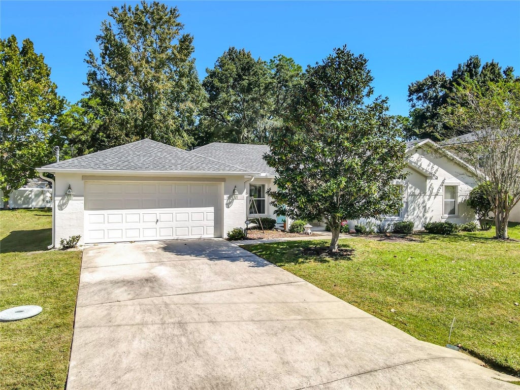 Photo of 19 Poppy Lane, Palm Coast, FL 32164 (MLS # FC322365)