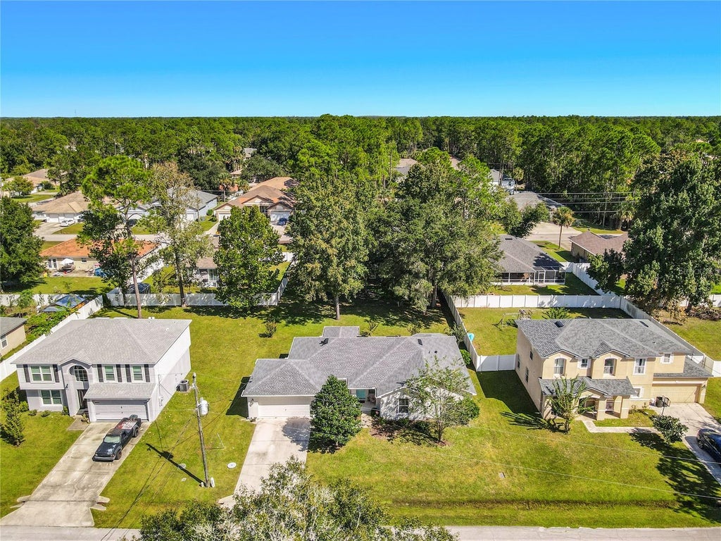 Photo of 19 Poppy Lane, Palm Coast, FL 32164 (MLS # FC322365)