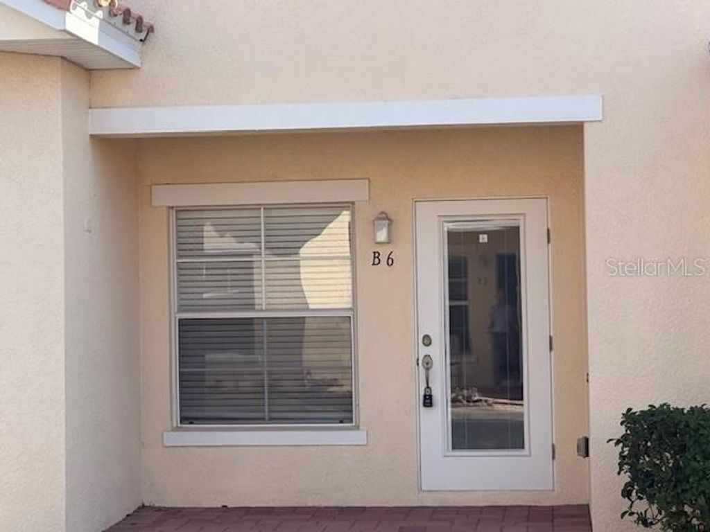 Photo of 1023 David Walker Drive #B6, Tavares, FL 32778 (MLS # O6359583)