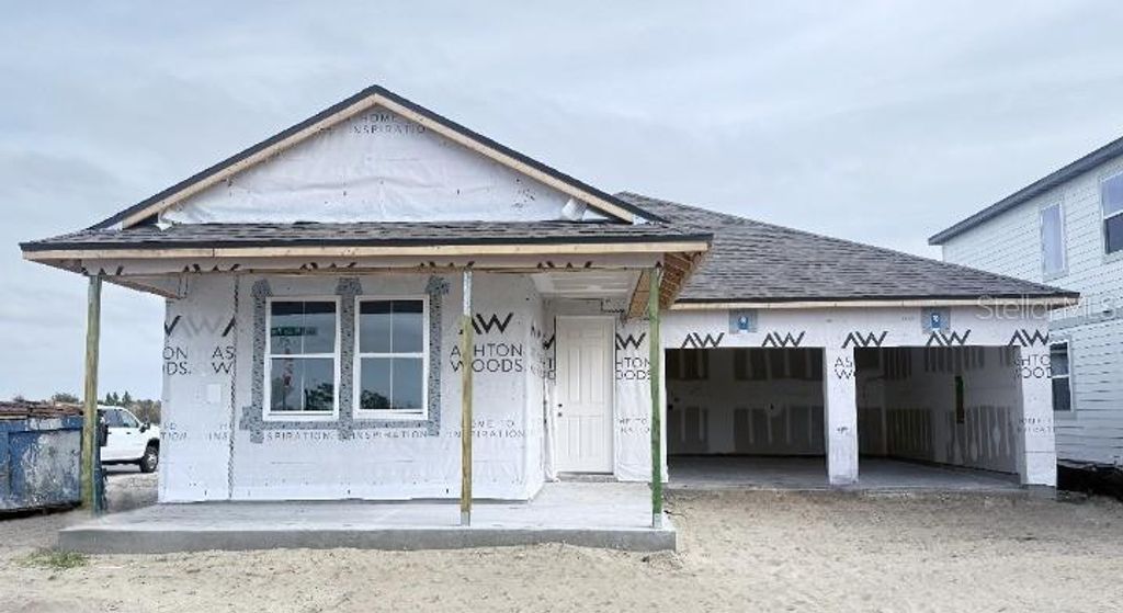 Photo of 30141 Misty Pines Rd, Mount Dora, FL 32757 (MLS # TB8465201)