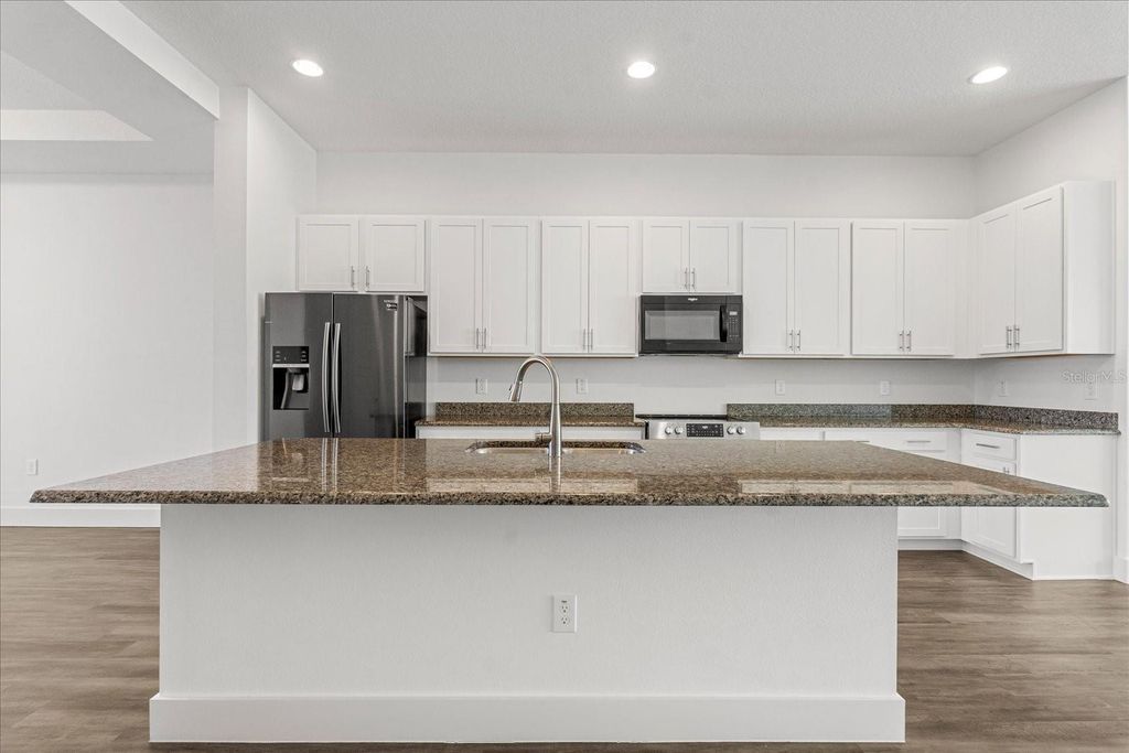 Photo of 13043 Michael Callin Alley, Orlando, FL 32828 (MLS # O6407141)