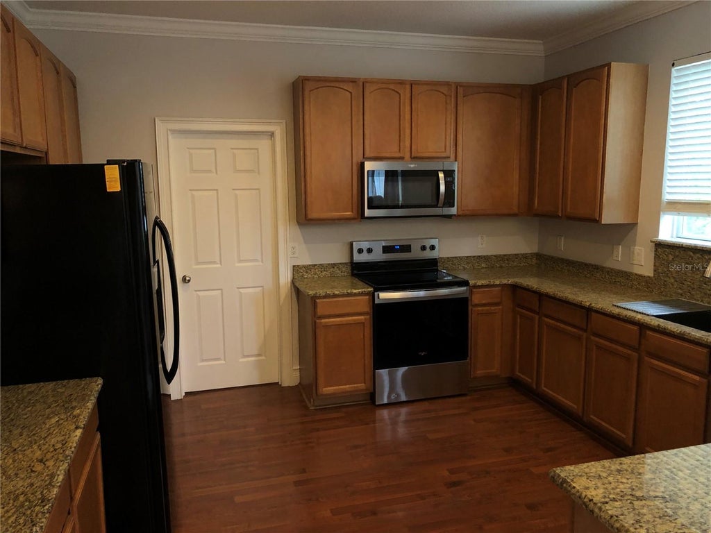 Photo of 13125 Oulton Circle, Orlando, FL 32832 (MLS # O6452497)
