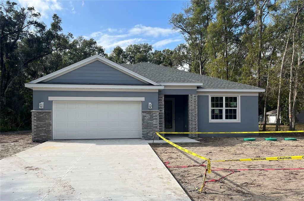 Photo of 1209 Racine Road, Orange City, FL 32763 (MLS # O6381061)