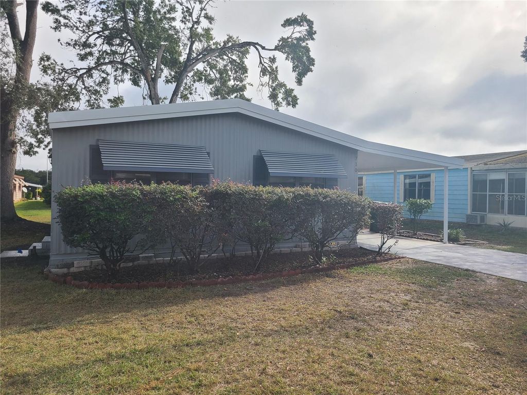 Photo of 710 Coachman Drive, Leesburg, FL 34748 (MLS # G5105383)