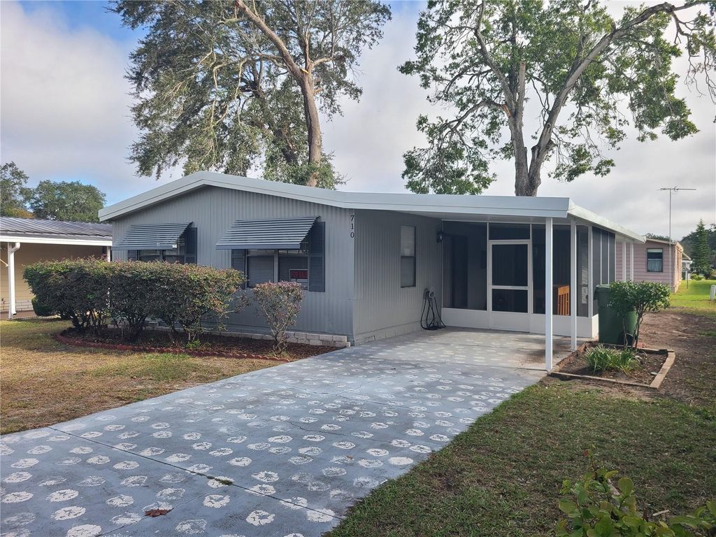 Photo of 710 Coachman Drive, Leesburg, FL 34748 (MLS # G5105383)