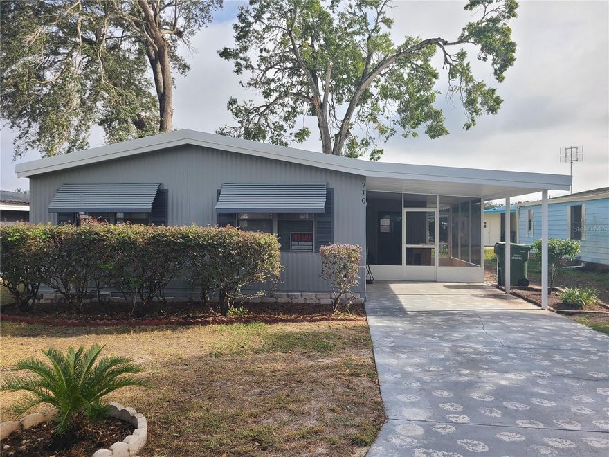 EVERYTHING IS NEW! Complete rehab just finished on this retirement home in Central Florida. Brand new membrane roof spans the entire house including utility room and screened lanai. New HVAC, Luxury Vinyl floors throughout, Stainless Steel Appliances, and fresh paint inside and out. Termite stations through Dean's. The ALL NEW KITCHEN features soft close doors and drawers with beautiful dimensional laminate counters. All LED lighting. Both bathrooms completely redone. Move right in and start enjoying the relaxed Florida lifestyle. Located in Leesburg, FL - only 8 miles from Brownwood Paddock Square in The Villages and 2.3 miles to Downtown Leesburg or Venetian Gardens. One of THE LOWEST HOA's around at $50/mo. DON'T WAIT!