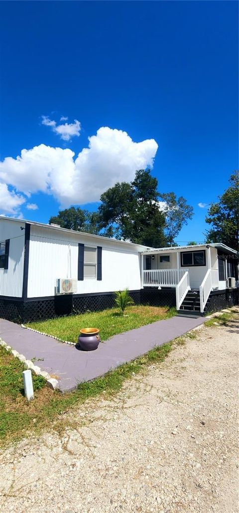 Photo of 9857 8th Avenue, Orlando, FL 32824 (MLS # O6349930)