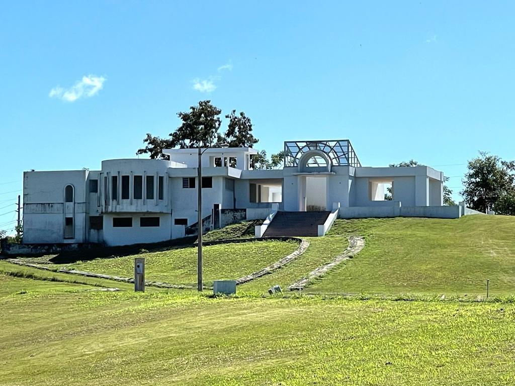 Property with excellent location, located minutes from the PR-100 highway, a short distance from the town of Cabo Rojo, Joyuda, some of the best beaches in the area, highway number 2 and the Mayagüez Mall, with a beautiful partial ocean and mountain view. Enjoy a fresh, private and quiet environment. The home is a custom and exclusive residence with beautiful marble floors all around the house and marble tiles on the walls of all the bathrooms. This mansion is built entirely in reinforced concrete and has approximately 7,500 square feet which requires some finishes like, windows, doors, cabinets, etc. In the main level will find 5 bedrooms, 4.5 bathrooms, big living room, kitchen, and also open terrace, covered terrace, cinema room and interior garden. In the lower part of the residence there is a 1 bedroom and 1 bathroom apartment for visitors or service personnel, space for office and storage room, with a comfortable garage for four cars and a room for electric generator and water cistern. The property can be your main home or can be used for luxury vacation rentals. The property has 5 acres of land with a preliminary development of 9 lots of approximately 1,000 square meters each, with water installation, road, sidewalks, lighting poles. Which gives the option to sell the lots or keep the property as one. The area is surrounded by exclusive residential properties which adds value to the property.