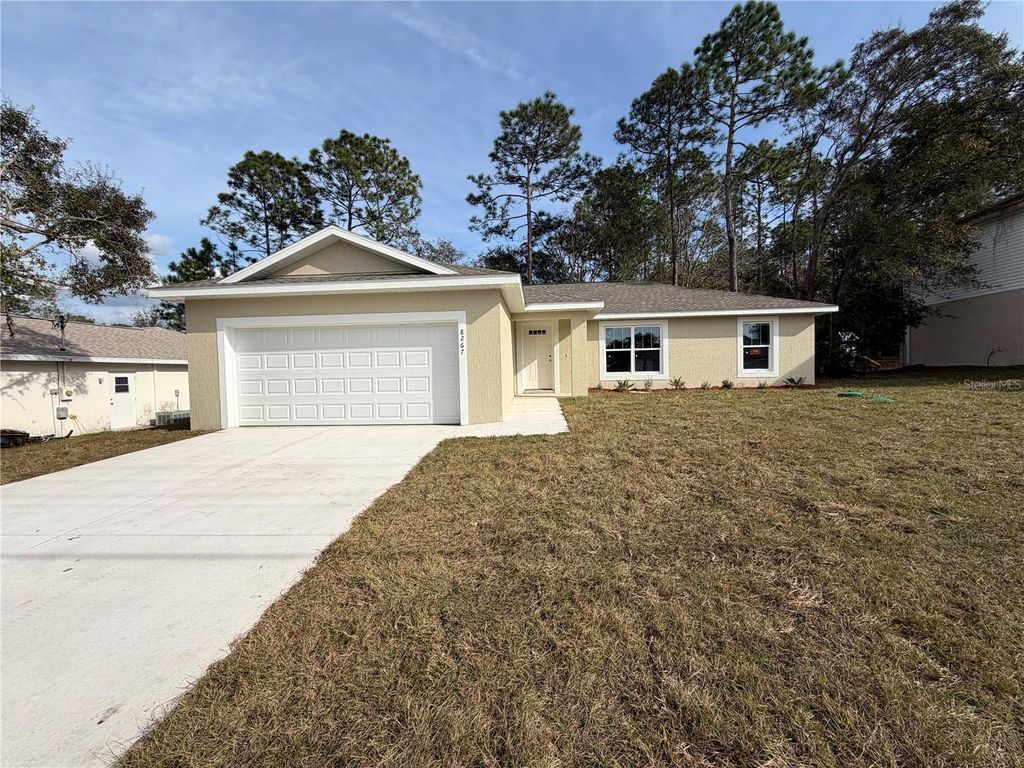 Photo of 8267 N Santos Drive, Citrus Springs, FL 34434 (MLS # O6374651)