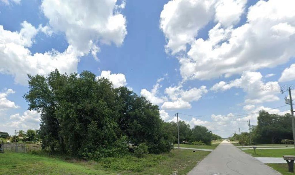 Photo of 2810 51st Street SW, Lehigh Acres, FL 33976 (MLS # O6319754)