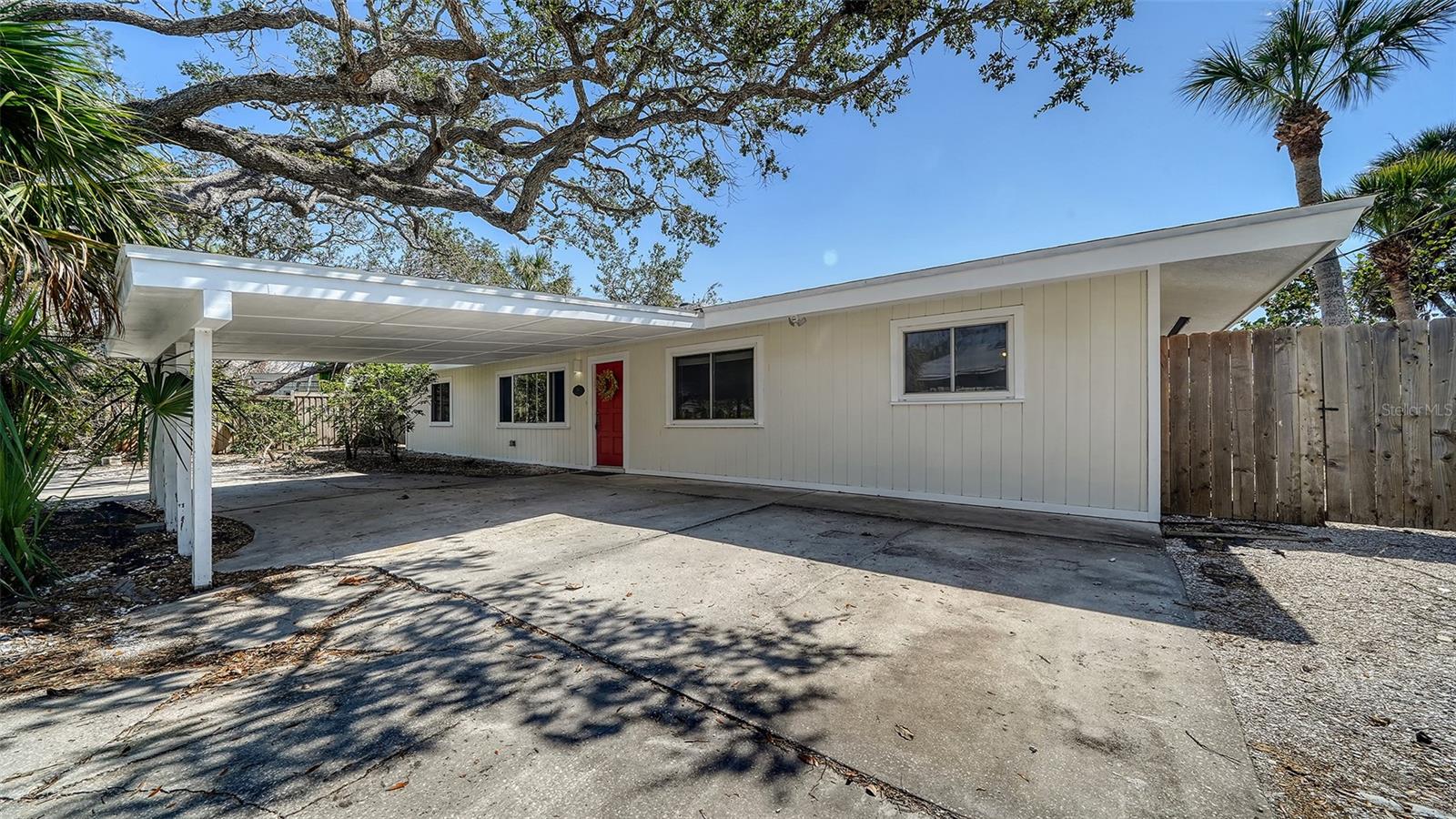 Huge Price Reduction.....Motivated Seller.....Location and opportunity...Don't miss this 4 bedroom, 3 bath pool home that sits on a well positioned larger lot with 97 ft. of canal access. The home was impacted by hurricane Helene but has been remediated and is ready for renovations, redesign or rebuild. The existing open floor plan features a large kitchen and dining area, living room with wood burning fireplace, sun room overlooking the pool and split bedrooms. Located walking distance from the vibrant Village of Siesta Key and Siesta Key Beach which was recently voted the #1 beach in the USA and #4 in the world. There is easy access to downtown Sarasota to visit the arts district, theater, fine dining, and shopping at St. Armands Circle. Endless opportunities to live in paradise and experience all Siesta Key has to offer. Schedule your showing today.