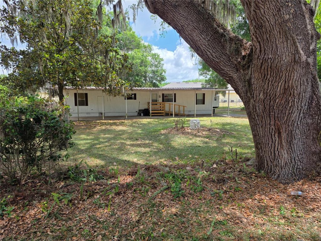 Photo of 16995 SE 101st Court Road, Summerfield, FL 34491 (MLS # OM723801)