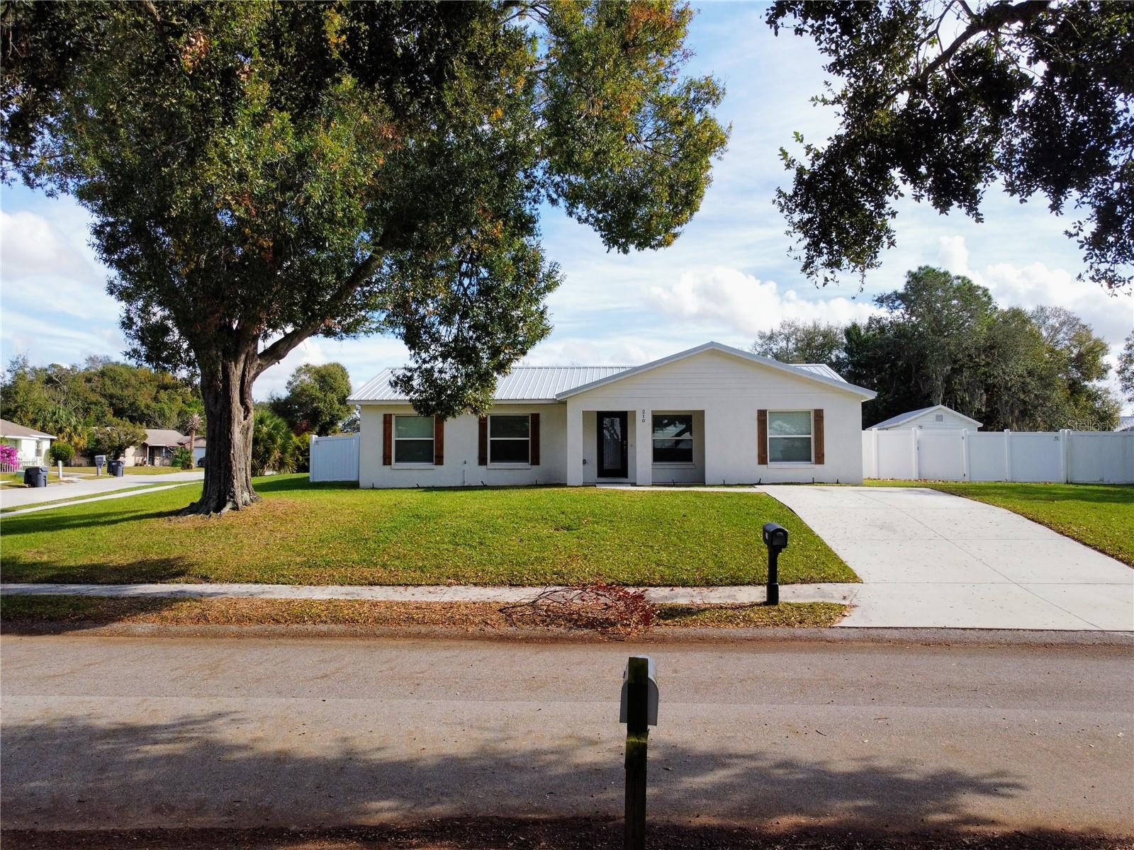 Price Improvement! Welcome to your dream home in a well-established neighborhood! This stunning 4-bedroom, 2.5-bath POOL home was completely rebuilt in 2021, combining modern comfort with durability. Only the original concrete slab and outer block walls remain—everything else has been rebuilt to code! It has safely weathered three major hurricanes (Ian, Helene, and Milton) with no damage or leaks, showcasing its solid construction.
Step into the gorgeous new kitchen, featuring soft-close shaker cabinets, quartz countertops, stainless steel appliances, and a center island perfect for gatherings. The home boasts a new metal roof, double-pane windows, new plumbing and electrical systems, a new water heater, central AC, and wired smoke alarms for your peace of mind. You'll love the waterproof luxury vinyl plank (LVP) flooring throughout, with no carpeting for easy maintenance.
The open-concept design makes this home ideal for entertaining. The spacious living area flows seamlessly to the outdoors through French doors, leading to a screened back patio and a newly resurfaced pool (2021), perfect for enjoying Florida’s sunshine year-round.
Set on a .28-acre corner lot, the fenced backyard is a private retreat, complete with a storage shed and a large concrete slab—perfect for building a she-shed, man cave, or even parking an RV. No HOA fees add to the appeal, and there’s even a potential income stream from using the bedrooms as short-term rentals.
Located across from Lake Thomas, you'll have convenient access to a boat ramp just a few hundred yards away—a great spot for enjoying Florida’s beautiful sunsets. Plus, commuting is easy with quick access to SR 570, and you’re just an hour from both Tampa and Orlando. Enjoy the best of Winter Haven’s slower-paced living, with Lakeland right next door and Legoland only 9 miles away.
Don’t miss your chance to own this exceptional gem!
