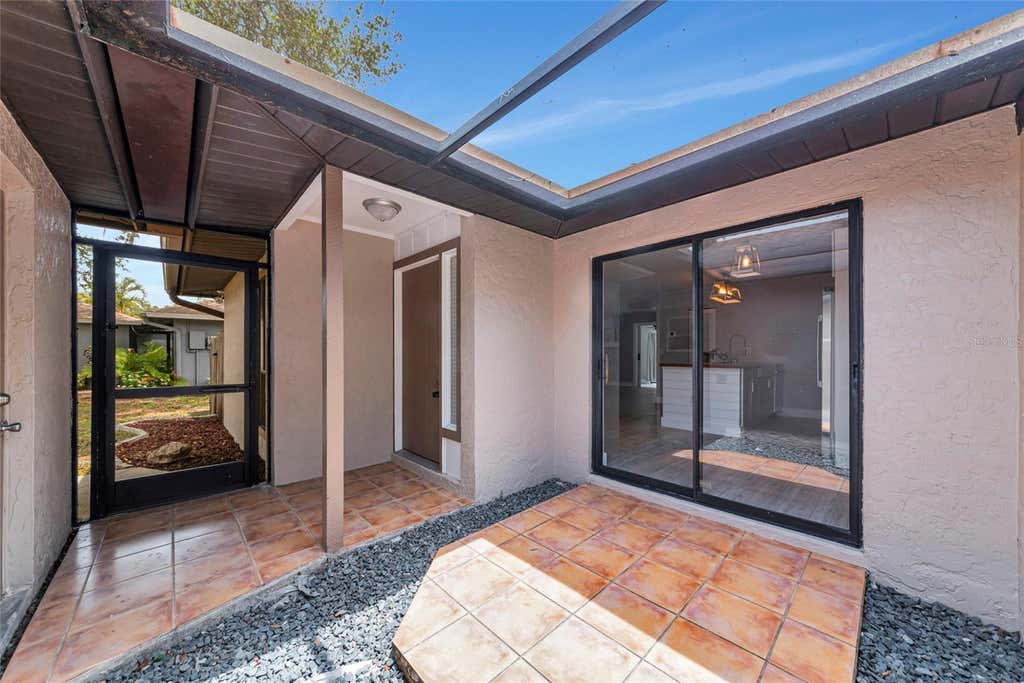 Photo of 5176 Cedar Hammock Lane, Sarasota, FL 34232 (MLS # A4696717)