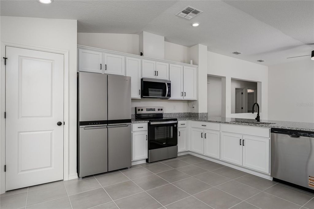 Photo of 10468 Wet Marsh Cove, Parrish, FL 34219 (MLS # A4687888)