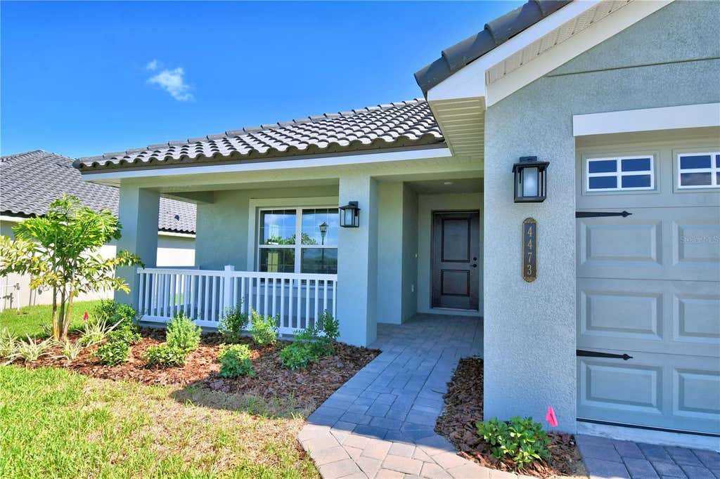 Photo of 4964 Tennessee Lake Drive, Auburndale, FL 33823 (MLS # L4964139)