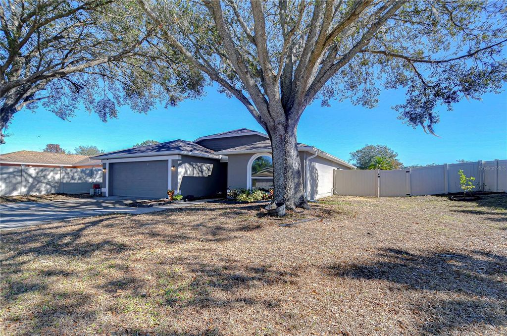 Photo of 1732 Tinker Drive, Lutz, FL 33559 (MLS # TB8327088)