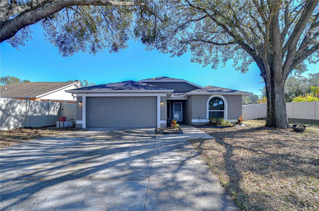 Photo of 1732 Tinker Drive, Lutz, FL 33559 (MLS # TB8327088)