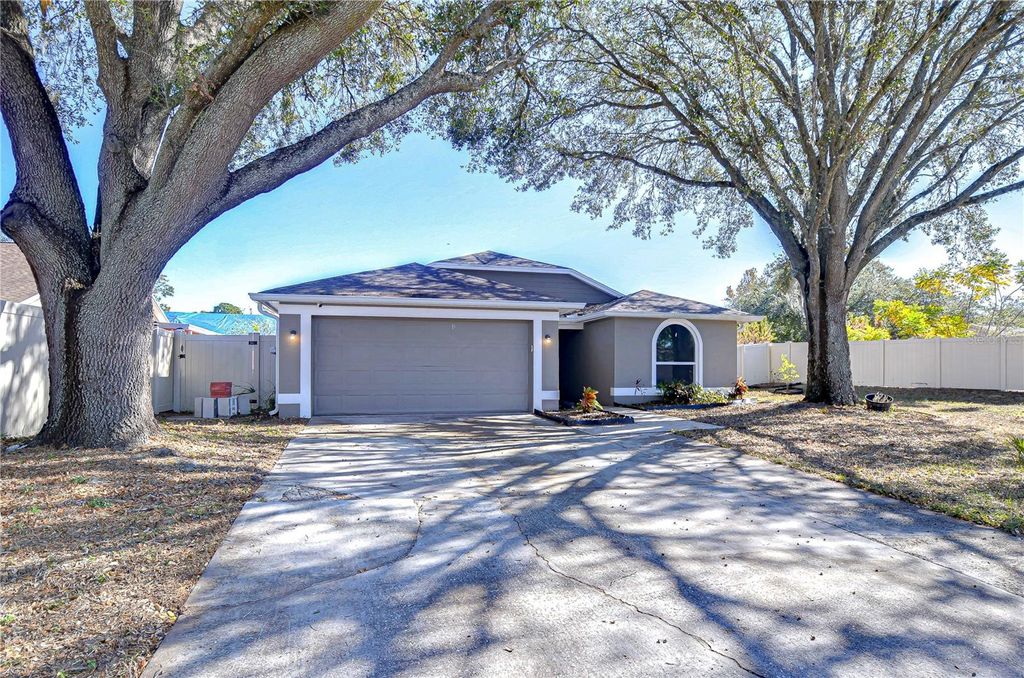 Photo of 1732 Tinker Drive, Lutz, FL 33559 (MLS # TB8327088)