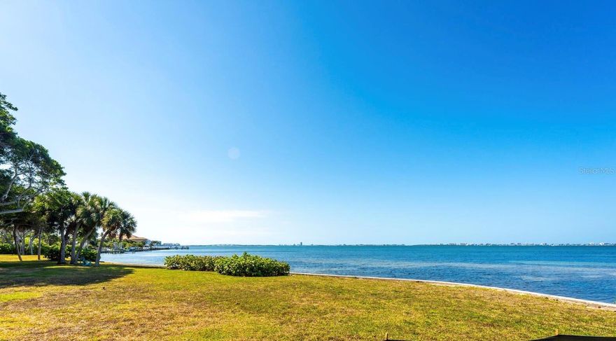 Last list price adjustment before seller commits to a build project on the property.Seller financing possible. EXCEPTIONAL WATERFRONT PROPERTY, Directly on Sarasota Bay!  This coveted Bay Shore Rd address is zoned Estate, over .76 of an acre waterfront, neighborhood by many bay front estates properties Spectacular views across the water to downtown Sarasota, Ringling Bridge, Lido Key, Longboat Key, and New Pass out to the gulf, and year round sunsets! Majestic oaks provide an enchanted canopied entry to this over 300' deep property opening up to the expansive water views at the rear of the property.  Situated in the beautiful Indian Beach neighborhood, located just 2 miles north of downtown Sasasota, surrounded by the Ringling College of Art and Design, Ca'd'Zan, the Also Theater, waterfront park, and so much more. Featuring some of Sarasota's most beautiful historichomes in addition to new masterpieces, Indian Beach is truly the heart of everything.  This is a rare opportunity to find a large, direct waterfront, west facing property to build your dream home, come see it today