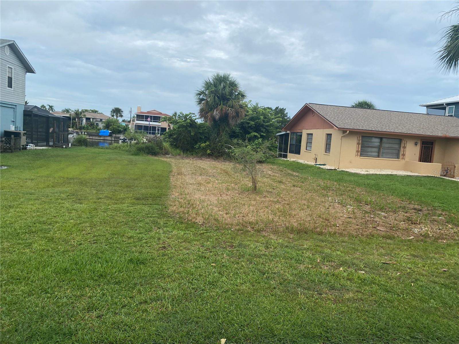 Fantastic Location in the highly desirable middle section of Hernando Beach. Enjoy the freedom of no HOA or deed restrictions.You can build the house of your dreams without many design restrictions other than being elevated. This lot is perfect for a great vacation home as there are no lease/rental restrictions. The west view from the backyard will astound with stunning sunsets nightly.This property is situated on the beautiful Swan canal.Property is just a 3 minute boat ride to the new boat lift for swift Gulf of America access. Whether you Kayak,jet ski, or fish it won't disappoint. Enjoy the flats,or quickly get to Anclote key or Homosassa.
Vacation where you live,and embrace the coastal lifestyle here. The Marina &,boat ramp are is just a skip away. You can walk
or bike to wonderful waterside restaurants ,Tiki Bars or the neighborhood store. Enjoy watching the Dolphins and manatees, or take a hike in the beautiful nature preserve . All amenities are a mere 10 minutes away for you convenience. It is a fast 45 minute commute Tampa.Look no further, this property checks all the boxes.