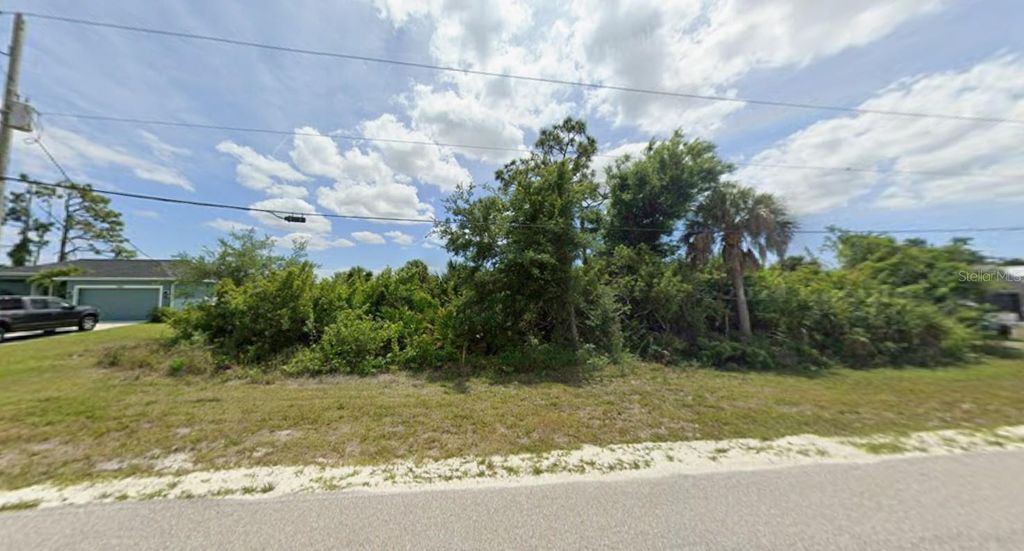 Photo of 12155 Foresman Boulevard, Port Charlotte, FL 33981 (MLS # N6142283)