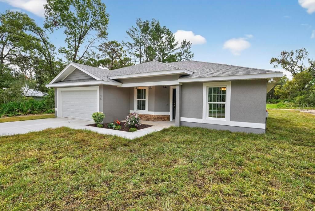 Photo of 36 Fisher Lane Course, Ocklawaha, FL 32179 (MLS # G5102969)