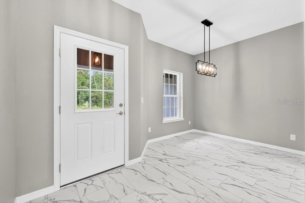 Photo of 36 Fisher Lane Course, Ocklawaha, FL 32179 (MLS # G5102969)