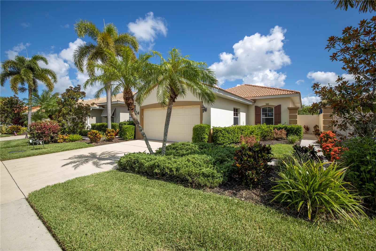 Enjoy MAINTENANCE-FREE living at its finest in this perfectly appointed home in the gated community of Venetian Golf and River Club! This property offers spectacular GOLF COURSE VIEWS from the expansive screened-in patio, as well as LAKE VIEWS in front of the home. Featuring 2 bedrooms, 2 bathrooms, and an oversized 2 car garage, this ANNUAL UNFURNISHED rental is ready for immediate occupancy. This home is in pristine condition with NEW carpets in the bedrooms and NEW A/C installed in 2022. The master bedroom features 2 large walk-in closets and an en-suite bathroom with dual vanities and walk-in shower. As a tenant, you will have FULL ACCESS to the first class amenities offered at Venetian Golf and River Club, including 2 resort style swimming pools, tiki bar, fitness center, sport courts, restaurant, clubhouse, walking trails with access to the Myakka River, and OPTIONAL golf memberships are available! RENT INCLUDES internet AND cable, exterior landscape maintenance and HOA fees for community amenities. Adding to the property’s appeal, you are within minutes to I-75 and US-41 and downtown Venice and the beaches are 15 min away! Owner will allow 2 dogs at their discretion.