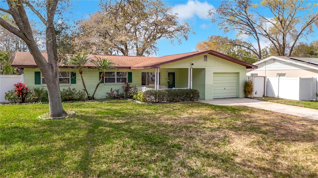 Photo of 11328 N Oakleaf Avenue, Tampa, FL 33612 (MLS # TB8477162)