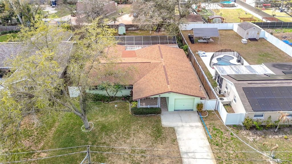 Photo of 11328 N Oakleaf Avenue, Tampa, FL 33612 (MLS # TB8477162)