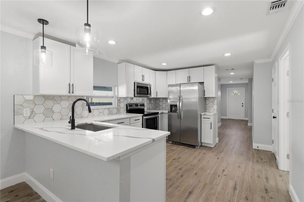 Photo of 2623 E 38th Avenue, Tampa, FL 33610 (MLS # TB8509026)
