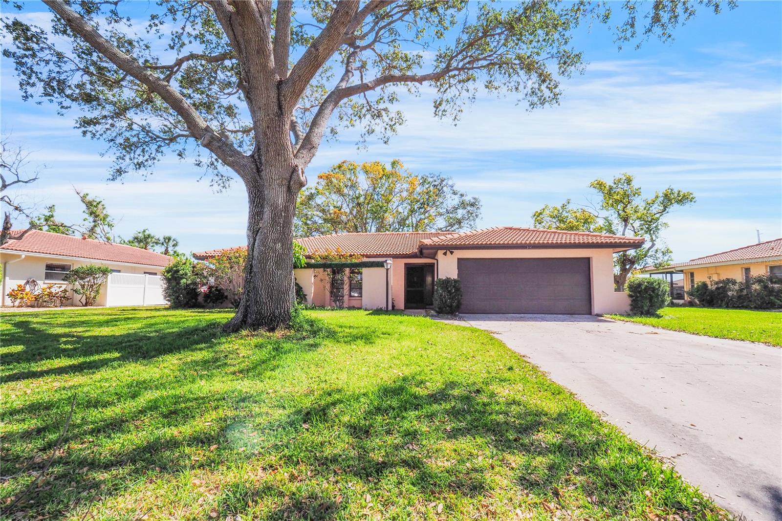 SORRENTO EAST !!!!!Two Bedrooms / Two Baths / Two Car Garage located in desirable Sorrento East. Low HOA and NO CDD!! Large lot, new master bath, re-piped in 2022, new A/c July 2024. Screened Lanai, Irrigation system, Hardwood and Tile floors, sewer pipes cleaned from house to street. Located close to Island of Venice, Venice Beach, Nokomis Beach, and Siesta Key. Minutes to all types of shopping.