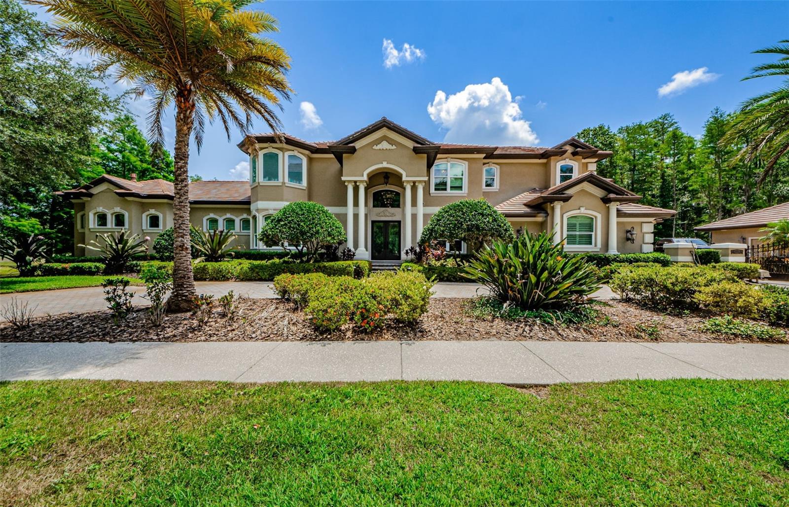 Luxury Custom Built Executive Home located in the Private, Gated community of Wentworth on an Oversized .77 Acre Premier Golf Course Homesite. Resort style living at its Finest! Beauty Awaits you as you step inside this Fantastic Luxury Home. From the breathtaking Golf Course/Preserve Views and the Pristine Tropical Landscaping around, this Home is a Masterpiece with almost 9400 SF of Living Space, 6 Bedrooms, Den/Study, 8 Bathrooms(6 full; 2 half baths), Spacious Formal Living Room with Vaulted Ceiling, Dining, Family Room with Fireplace, Bonus room/Billiards/High Tech Theater Room with Full Bar, Loft, Pool with Spa, 4 Car Garage, and Circular Driveway with private gate. The Stunning Updated Kitchen has 42 inch Custom Cabinetry, 6 Burner Gas Range, SUBZERO Refrigerator, Center Island, and Eat-In Area. Spacious Primary Suite (26 x 42) with 2 walk-in custom closets, stunning ensuite bath with Lots of Cabinetry, Marble Countertops, Walk-in Shower, Jetted Tub and Fireplace. 21 x 18 Fitness Center, A Second Primary Suite on 2nd floor with Balcony boasting amazing views, 1st and 2nd Floor Laundry Rooms, Outdoor Kitchen, Fire Pit, Huge Covered Lanai featuring A sparkling pool and spa - Great for entertaining. Tile Roof, All Premier Lighting and Fans, Marble and Hardwood Flooring, Wine Cellar, Crown Molding, Vaulted Ceilings, Custom Staircases, Custom Double Glass Front Doors, Tray and Coffered Ceilings, Custom Built-ins, Pavered Lanai and Driveway, Tropical Landscaping Package, Whole house generator, plus much more. Community Amenities Include: 24 Hour Guard Gate, Golf, Dining/ Bar Country Club. Located near Beaches, Shopping, Schools, YMCA, Pinellas Trail, Hospital and Expressway to Airport/Tampa.