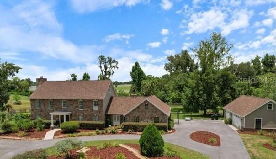 Welcome to this stately 2-story traditional home, built in 1982 and meticulously crafted with a blend of HardiPlank siding and stone for timeless curb appeal. Nestled on a spacious 1.65-acre lot, this residence boasts 4 bedrooms and 3 full baths, spanning approximately 4,092 sq?ft of refined living space.
From the moment you enter, you're greeted by a grand foyer with a striking staircase that leads to two expansive upper-level bedrooms and an impressive primary suite.
The primary suite offers a spa-inspired bath and generous walk-in closet. On the main level, The open-concept layout ensures seamless flow between the living, dining, and kitchen areas—perfect for both daily living and entertaining.
The heart of the home—a well-appointed kitchen—features ample cabinetry, solid surfaces, a center island, with a 4 seat bar and breakfast nook.A formal dining room off the kitchen enhances your entertaining possibilities.
With all-weather durability and elegant finishes, the exterior invites both tranquil retreat and grand outdoor gatherings. Imagine a covered patio overlooking manicured landscapes—ideal for enjoying Florida evenings.
3-car detached garage with mezzanine.
East-facing orientation for morning light.
A blend of traditional craftsmanship and timeless finishes throughout.