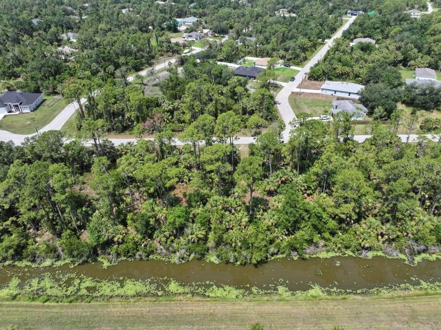 Discover the perfect opportunity to build your dream home on this exceptional lot in North Port! Nestled near a quiet cul-de-sac, this spacious property offers privacy and tranquility with minimal nearby neighbors and a peaceful creek running along the back. Surrounded by beautiful new construction, the neighborhood is rapidly growing and full of potential. Whether you're looking to invest or create a custom residence, this lot has it all—natural beauty, a serene setting, and a prime location. Don’t miss out on this hidden gem—come see it today and envision the possibilities!