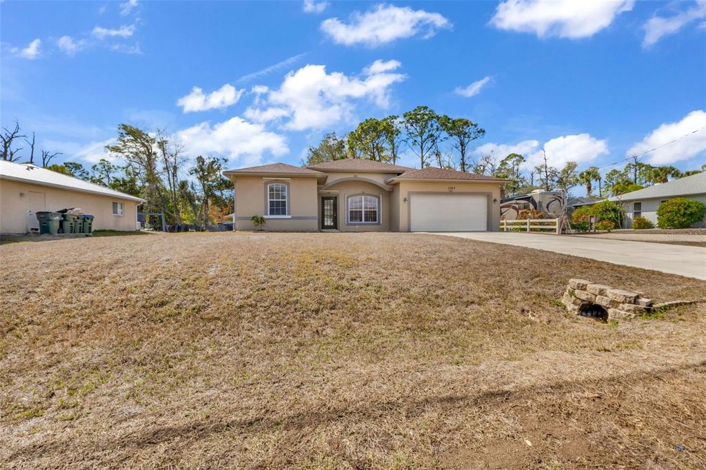 Photo of 1563 Marilyn Ln, North Port, FL 34286 (MLS # C7522689)