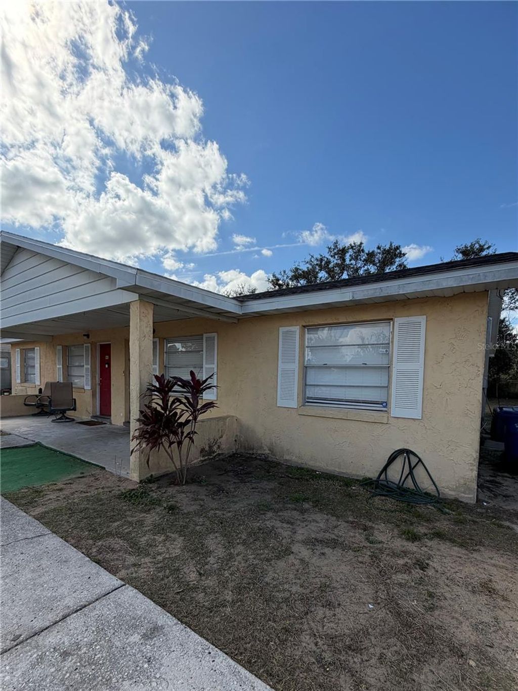 Photo of 943 S Char Mil Avenue S, Lake Alfred, FL 33850 (MLS # S5142714)