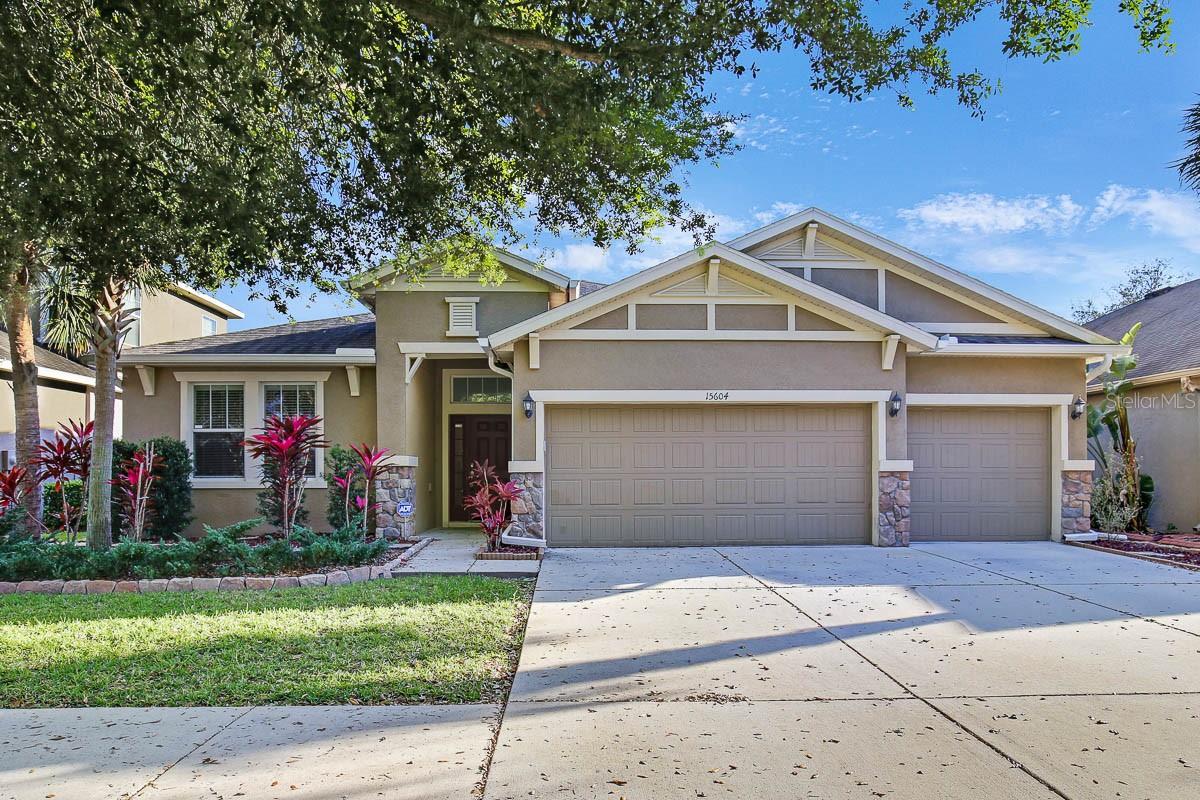 Nestled within the charming Starling neighborhood, this exquisite 3-bedroom, 2-bathroom home with a 3-car garage epitomizes the allure of FishHawk Ranch living. Step inside to discover a spacious formal dining/living room combo adorned with captivating wood flooring, ideal for hosting gatherings. The kitchen is a chef's delight, boasting abundant cabinetry, stunning granite countertops, top-of-the-line stainless steel appliances, and an elegant stone backsplash. A generous island and walk-in pantry ensure ample storage, while the separate breakfast nook is perfect for casual dining. The family room provides ample space for oversized furniture, and sliding glass doors lead to the covered and screened lanai, complete with a hot tub for your enjoyment. Retreat to the luxurious Primary suite featuring plush wall-to-wall carpeting and an opulent en-suite bathroom equipped with a dual sink vanity boasting granite countertops, a private water closet, breathtaking shower, large soaking tub, and an exceptionally spacious walk-in closet. The well-designed split floorplan offers privacy, with a sizable bonus room suitable for homeschooling, TV viewing, or gaming, along with the secondary bedrooms and an additional full bathroom. As part of the Fishhawk HOA community, residents enjoy access to a plethora of amenities, including several community pools, three fitness centers, dog parks, playgrounds, and parks, fostering a vibrant sense of community and leisure. Complete lawn maintenance, including mowing, shrub pruning, irrigation system service, turf, and plant fertilization and plant pest control are included in rent services saving you time and money! NOTE: Additional $59/mo. Resident Benefits Package is required and includes a host of time and money-saving perks, including monthly air filter delivery, concierge utility setup, on-time rent rewards, $1M identity fraud protection, credit building, online maintenance and rent payment portal, one lockout service, and one late-rent pass. Renters Liability Insurance Required. Call to learn more about our Resident Benefits Package.