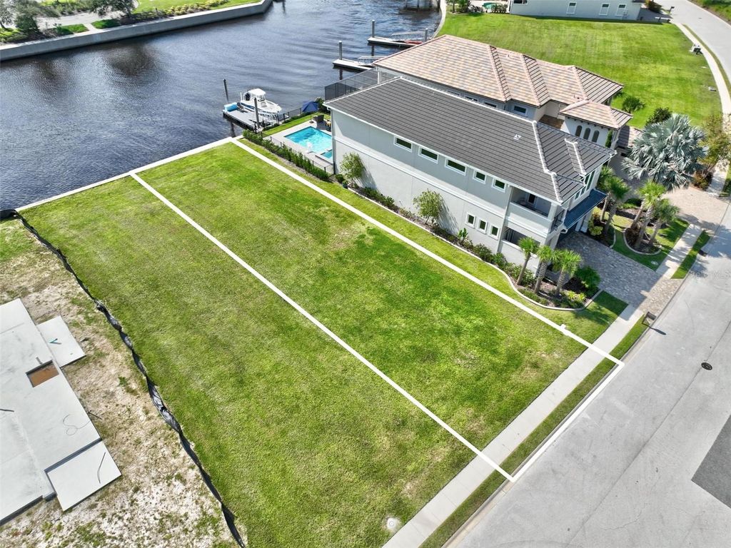 Photo of 310 Harbor Village Point N, Palm Coast, FL 32137 (MLS # FC312850)