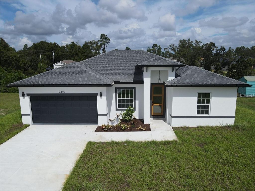 Photo of 572 W Bluster Place, Citrus Springs, FL 34434 (MLS # O6393130)