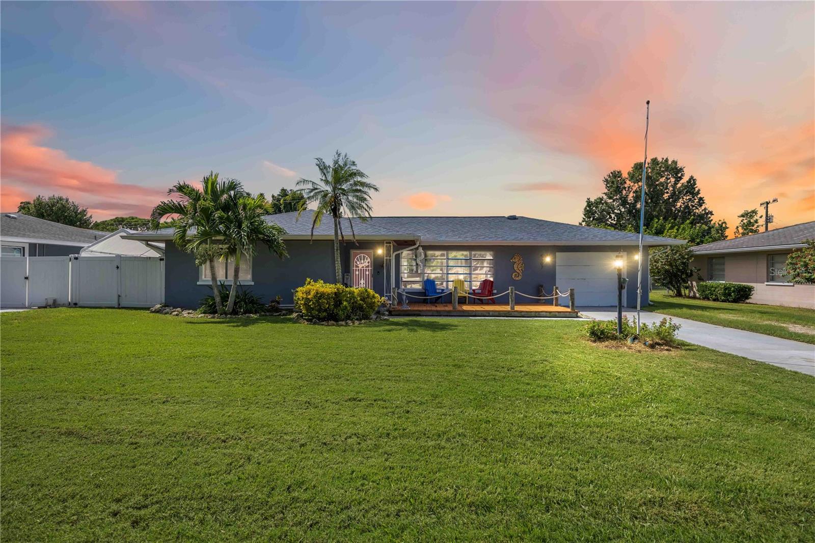 As you pull into the driveway of this West Bradenton ranch, mature trees and established landscaping create an inviting welcome. The home's classic curb appeal is complemented by a newer roof and fresh exterior upgrades, setting the tone for what’s inside. Step through the front door into a spacious Living Room, perfect for gatherings or quiet evenings at home. Natural light fills the space, flowing seamlessly into the Great Room where you can enjoy morning coffee or unwind after a long day. Terrazzo floors, recently refinished, add timeless character and a cool touch underfoot. The kitchen, fully renovated in 2022 with updated wiring, stands ready for everyday meals or entertaining, offering modern convenience with a nod to classic style. Two full bathrooms and four bedrooms provide ample space and privacy for family and guests. Head out to the backyard oasis. Here, an above-ground pool (2023) with a new pump, perfect for cooling off on hot Florida days. When the weather cools, the jacuzzi offers a peaceful spot to soak and stargaze. Practical upgrades throughout the home include new air conditioning systems (front 2024, back 2025), all-new ductwork and insulation, and impact front windows scheduled for installation in October 2025. City water serves the home, while a dedicated well with a recently replaced underground foot pump keeps the gardens green year-round. This home is move-in ready, combining sturdy construction, thoughtful updates, and a backyard built for enjoying Florida’s climate. Discover your next chapter here in West Bradenton.
